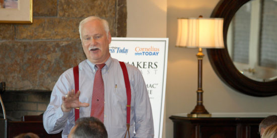 Commissioner Jim Puckett welcomes the crowd and introduces Mac McAlpine