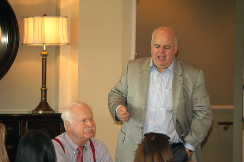 NCDOT's Warren Cooksey responds to a question while Commissioner Puckett listens