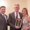 Brian and Tricia Sisson receive the 2015 Robert T. Cashion Business Persons of the Year. Pictured is Lake Norman Chamber President Bill Russell, Bobby Cashion, Brian and Tricia Sisson, and Chamber Board Chair Mike Russell. Photo by John McHugh/Ocaid Photography.