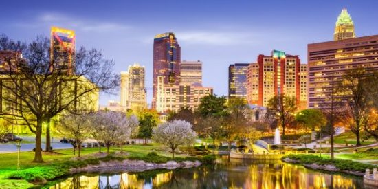 Charlotte, North Carolina, USA uptown skyline at Marshall Park.