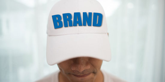 Blank white cap on the head ready for branding.