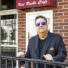 Ron Herbert in front of Red Rocks Cafe in Birkdale Village.