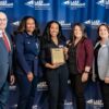 Mrs. Kimberly Courtland, of Merancas Middle College High School, (center) is recognized as the 2024 Educator of the Year for Charlotte Mecklenburg Schools. Also pictured is  Chamber Chair Jeff Tarte, Jametta Martin-Tanner Principal, along with Brandi Jones co-chair of the Chamber’s Education Collaborative, and former Huntersville Mayor Melinda Bales. Photo: Ocaid Photography