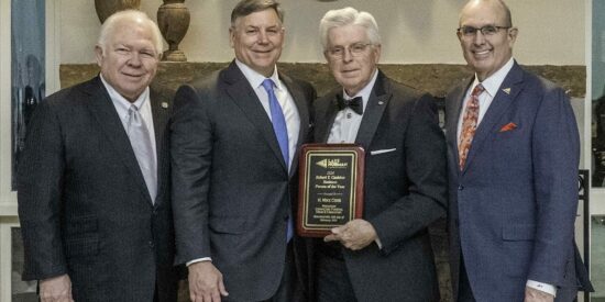 Mike Cook from Cavin Cook Funeral Home and Crematory receives the Robert T. Cashion Business Person of the Year from Bobby Cashion. Also pictured is Cook’s longtime friend Randy Marion and 2024 Board Chair Jeff Tarte. Photo by John McHugh / Ocaid Photography